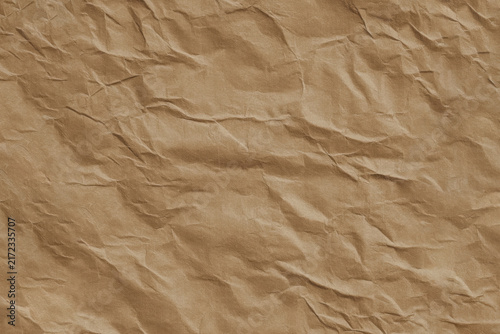 Принти на полотні Crushed brown paper texture background with realistic wrinkle detail and natural