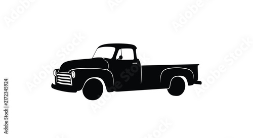 Vintage pickup truck silhouette against a white background classic old