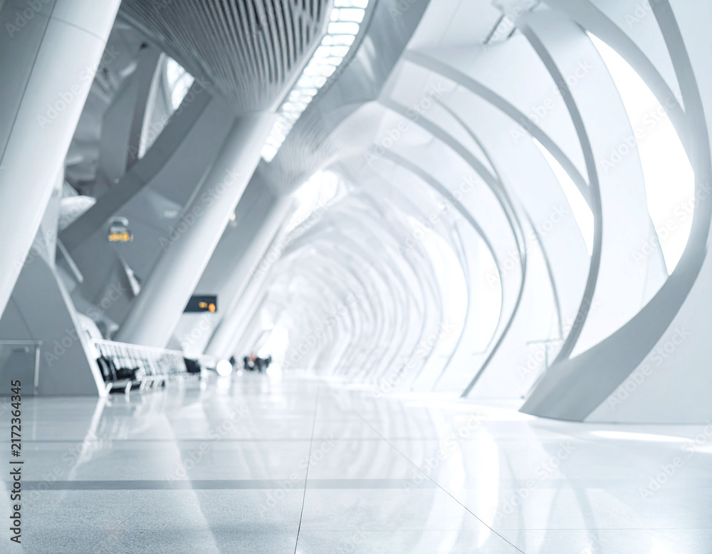 Obraz premium Futuristic modern architecture interior with bright curved pillars, evoking freedom and progress. Featuring nobody, this empty hall inspires sleek corporate travel concepts.
