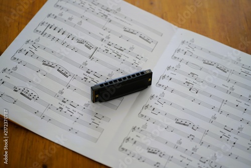 Sheet music and Harmonica
