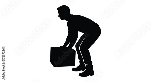 Man lifting cardboard box depicted as a black silhouette laborer