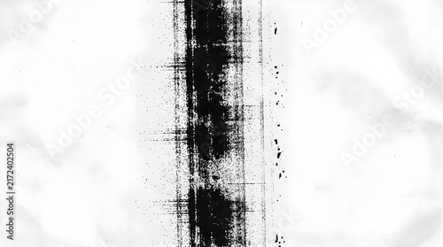 Distressed black ink vertical brush stroke texture on white paper background