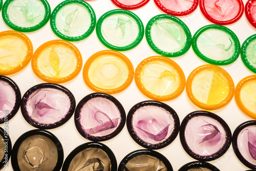 Colorful condoms background.
