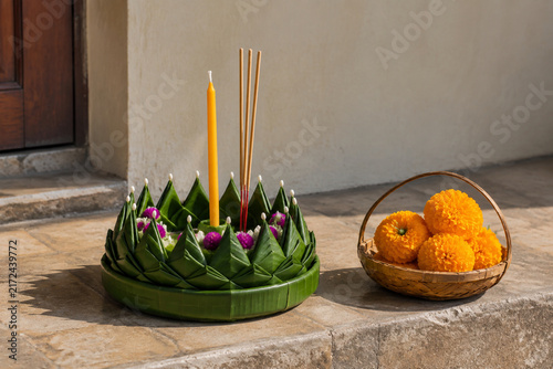 Banana leaf krathong with candle and incense, Thai tradition concept