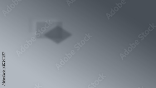 Abstract grey gradient background with soft blurred texture and subtle geometric shapes.