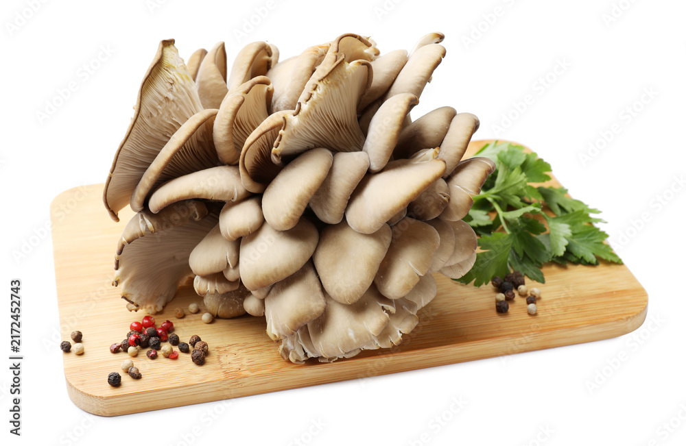 Fototapeta premium Fresh oyster mushrooms and spices isolated on white