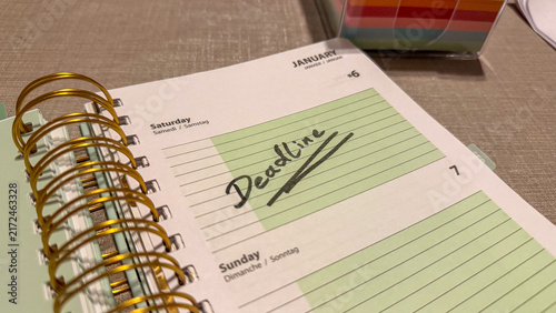 Weekend Deadline Written in Weekly Planner