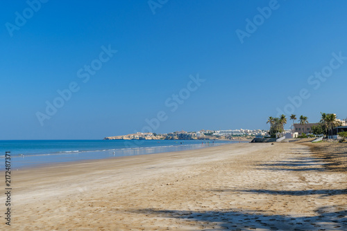 Obraz na płótnie Travel destination at Al Qurum Beach in Muscat Oman with tropical palms, sunny s