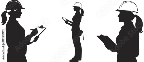Three silhouettes of female construction workers wearing hard hats, standing and holding clipboards to review site plans or project documentation on white background