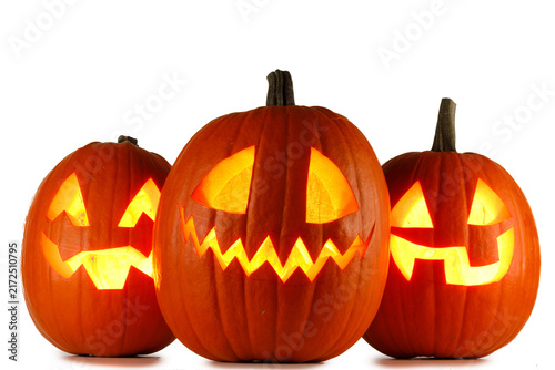 A carved Halloween pumpkin with glowing face