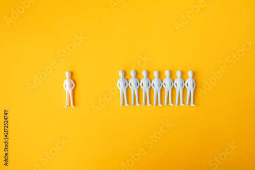 Workplace exclusion and social isolation with one person separated from group