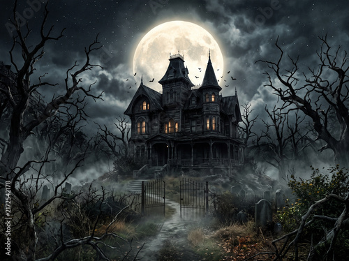 Spooky haunted Victorian house glowing under a large full moon at night surrounded by dead trees, graveyard, bats, and thick fog