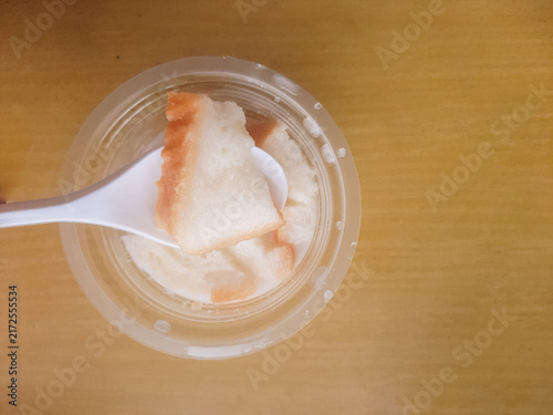 Cuadro en lienzo Warm bread and fermented cassava drink with coconut milk