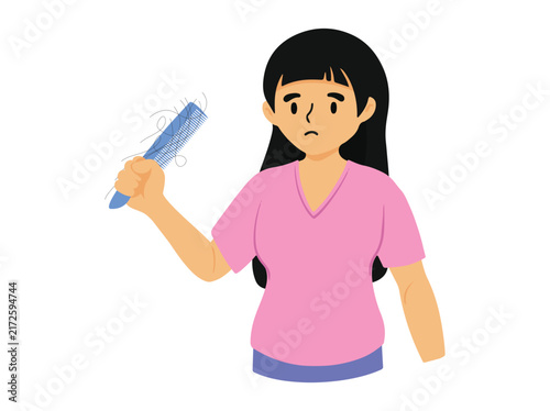 Woman Holding a Comb with Hair Loss
