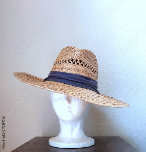 straw western hat with wide cloth hatband 