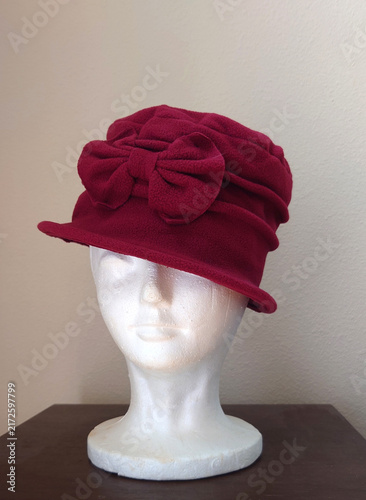 vintage red felt cloche hat evoking flapper, Gatsby, speakeasy era