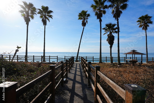 seaside walkway and gazebo in winter sea
