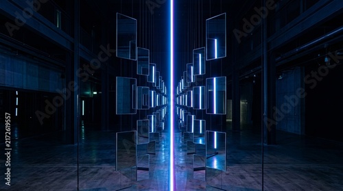 Abstract Light Installation With Reflective Mirror Panels And Blue Neon Glow In Dark Industrial Space