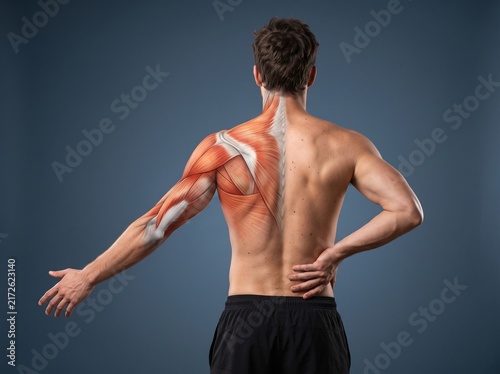 Male Back Pain With Visible Shoulder and Spinal Muscles