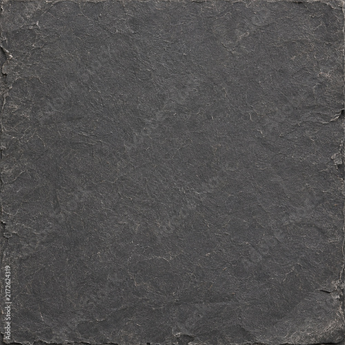 Charcoal gray handmade paper texture with rough deckled edges faint fibers soft mottling and subtle surface marks creating a dark neutral background for craft packaging print and editorial design