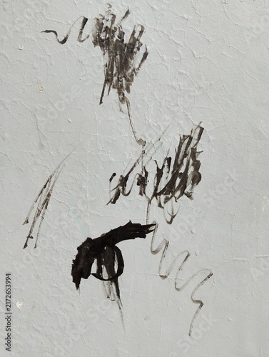 Fotografía Abstract chaotic ink lines and graffiti markings on weathered surface