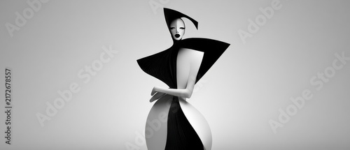Avant-Garde Fashion Design with Futuristic Black and White Abstract Sculpture