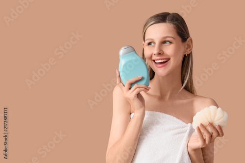 Skincare and beauty routine, happy woman holding shower gel and bath sponge f...