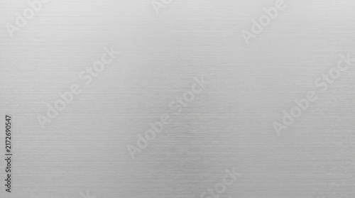 Brushed Metal Texture Background with Horizontal Fine Lines and Subtle Reflections