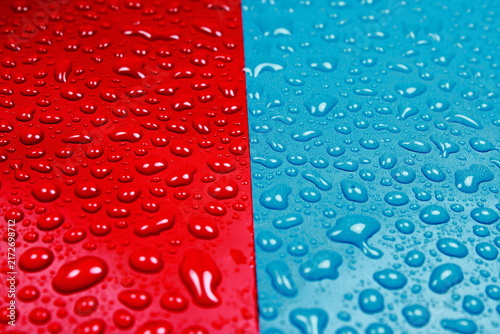Red And Blue Dual Tone Surface With Water Drops Condensation Texture Full Frame Background
