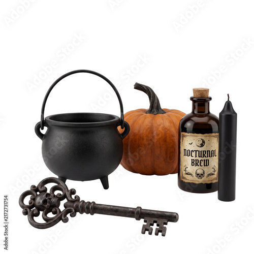 Halloween themed cauldron pumpkin and potion bottle.