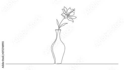 Elegant continuous line art drawing of a single blooming lily flower placed in a modern glass vase on a flat surface.