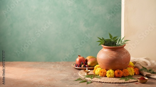 Minimalist Shitala Satam festival still life with traditional clay pot, flowers, fruits and Indian ritual decorations