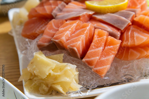 Canvastavla Angled View of Fresh Salmon Sashimi Platter Beside Pickled Ginger