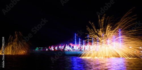 Golden sparks flew as the intangible cultural heritage of iron-making was displayed on the lakeside.