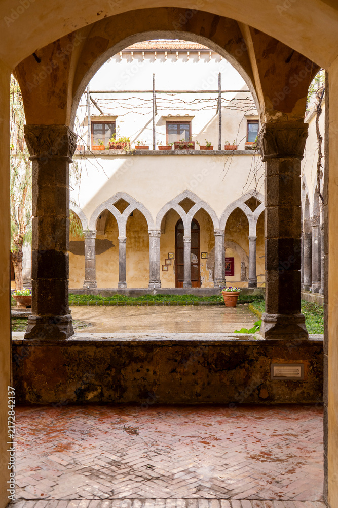 Fototapeta premium Saint Francis cloister courtyard seen through an arch