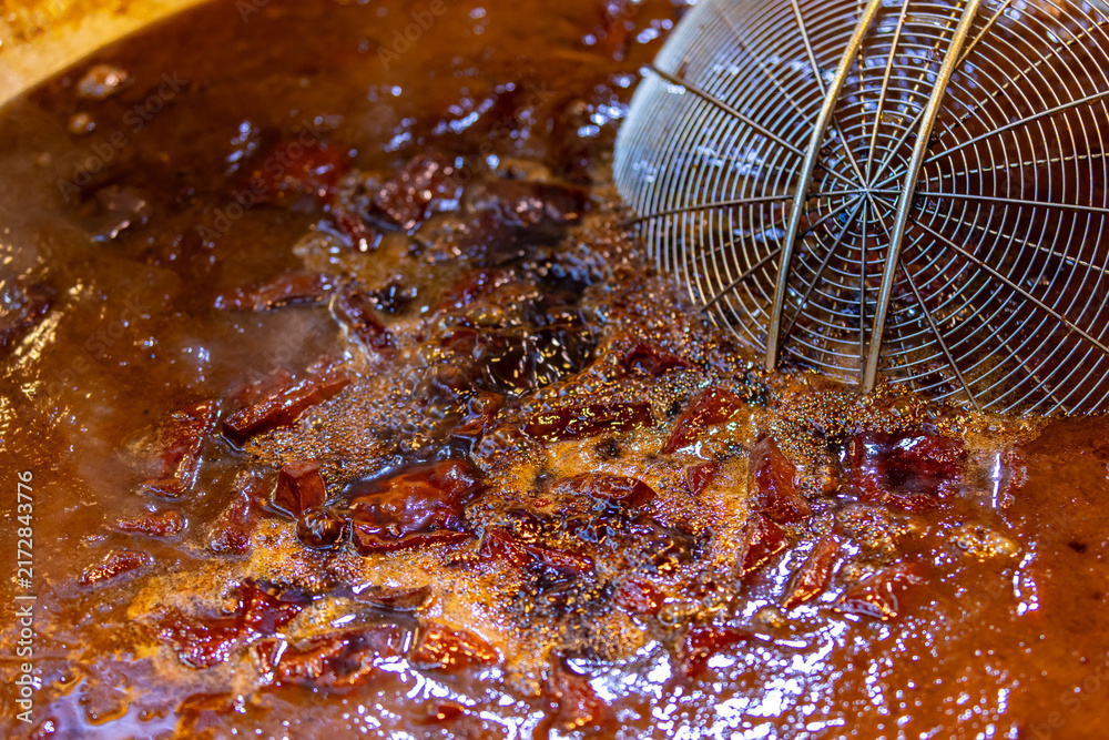 Obraz premium Braised Street Food Simmering in Spiced Broth
