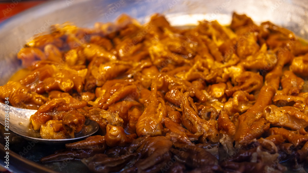 Obraz premium Braised Street Food Simmering in Spiced Broth