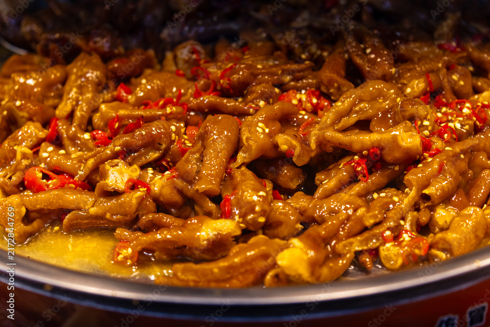 Obraz premium Braised Street Food Simmering in Spiced Broth
