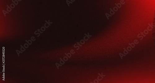 Abstract dark red background with grainy texture and soft light gradient