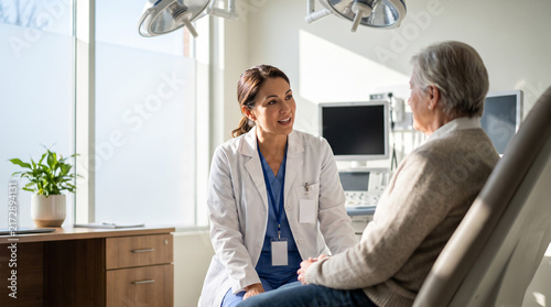 Professional doctor examining an elderly patient in a modern clinic. Physician providing clinical care during a checkup. Healthcare, medicine and patient treatment concept. Copy space