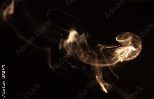 Foto Smoke on a black background. Shallow depth of field.