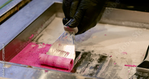 Konstfotografi Pink ice cream rolled on frozen plate, street food prep, culinary dessert making