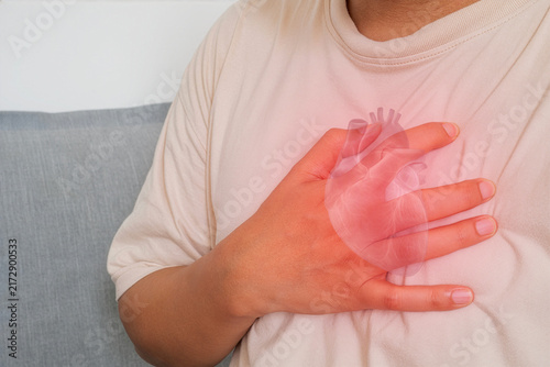 фотографія Heart chest pain showing a person holding the chest with highlighted heart anatomy for cardiology diagnosis treatment and cardiovascular health