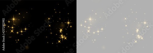 Obraz na plátne Clusters of shimmering golden stars scattered against a black background with so