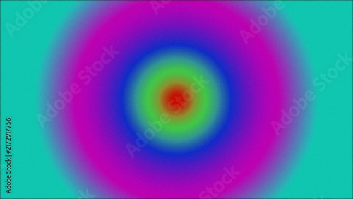 Concentric circles radiate from a central point colorful gradient
