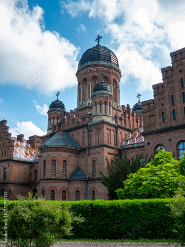 Historic building in Chernivtsi, Ukraine with distinct architecture under a clear blue sky