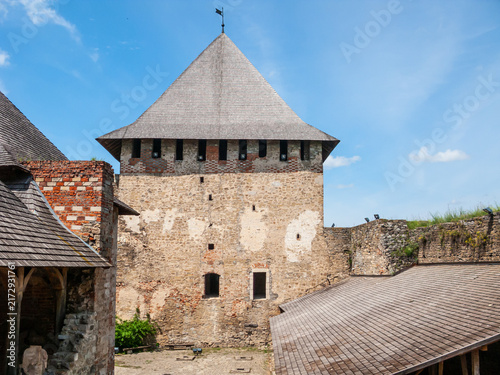 Khotyn fortress stands tall under the bright sky in Khotyn, Ukraine during the day