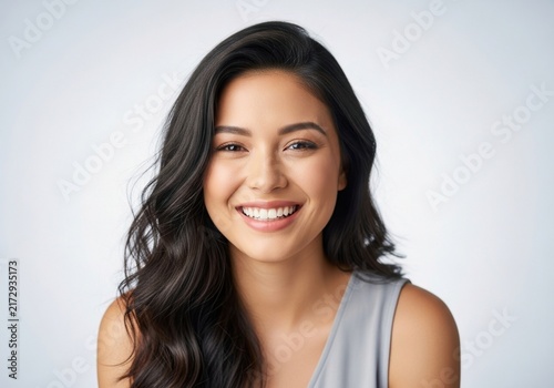 Smiling woman with long dark hair