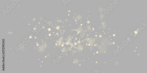 Fotografie Scattered golden bokeh lights float against a deep black background