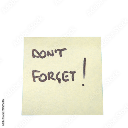 Foto A yellow sticky note has DON'T FORGET!